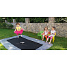 In-ground sports trampoline PRIMUS FLAT, 427 x 305 cm. The top-range in-ground sports trampoline with a safety net can be used b
