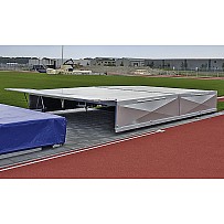 Movable cover for pole vault and high jump mats